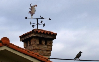 DIY weather vane on a chimney